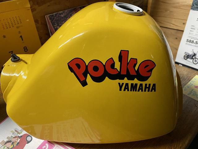 何でか