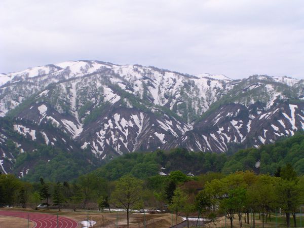 対岸の風景と対峙