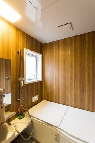 木目を使用し、温かみのある癒しの空間に